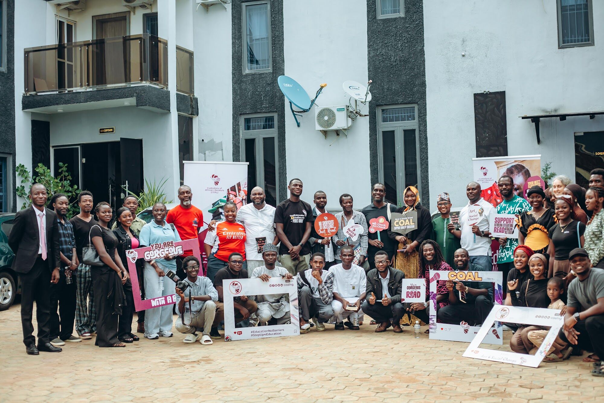 Readers gathered at a COAL book reading